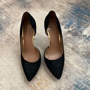 Black suede pumps